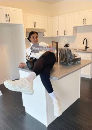 One year after moving to Canada, a Nigerian woman rejoices over purchasing a home there because "God Did It."
