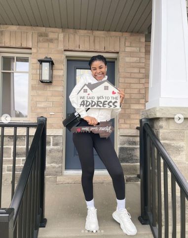 One year after moving to Canada, a Nigerian woman rejoices over purchasing a home there because "God Did It."