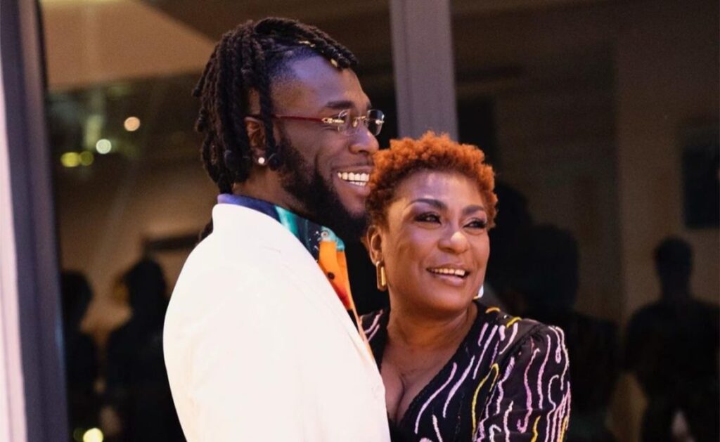 Watch the Moment: During Burna Boy's birthday celebration, his mother encourages him to get married and start a family (Video).